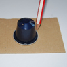 tracer le contour de la capsule sur du carton