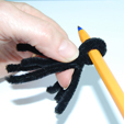 vriller la boucle avec un crayon