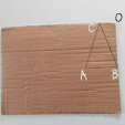 dessiner un triangle dans le coin de la feuille de carton