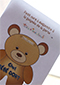 Superposer les 2 parties de l'ours sur une vitre
