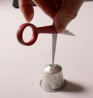 Percer la capsule