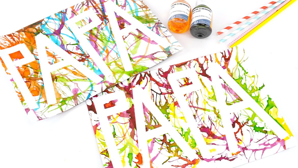 Réalisez un dessin coloré pour la fête des pères avec la peinture soufflée. Une activité facile dès 3 ans avec masking tape et paille.