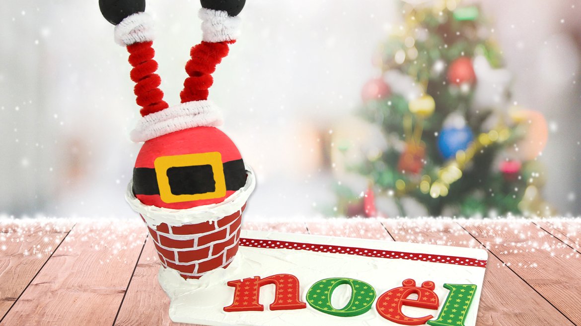Père Noël coincé dans la cheminée
