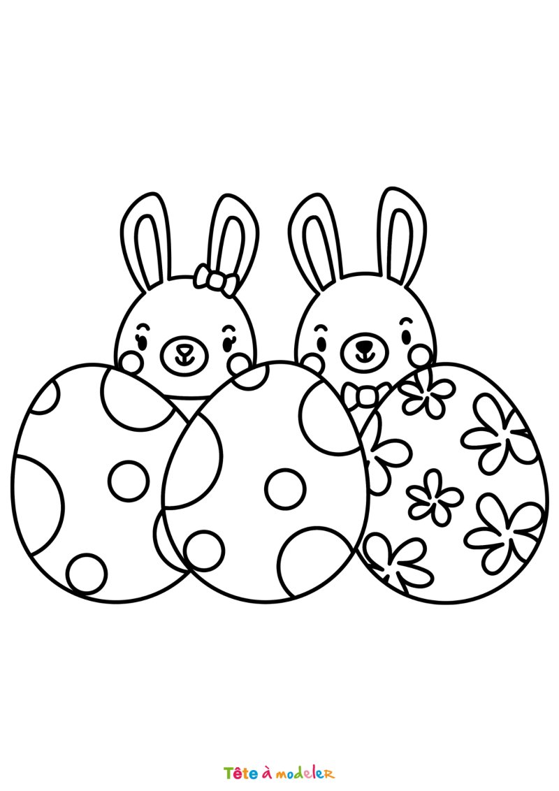 Coloriage de 3 lapins de Pâques avec des oeufs de Pâques