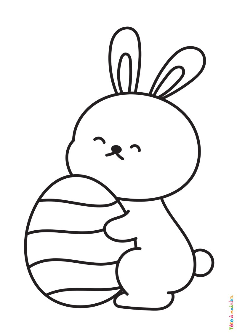 Coloriage d'un lapin avec un gros oeuf de Pâques dans les mains