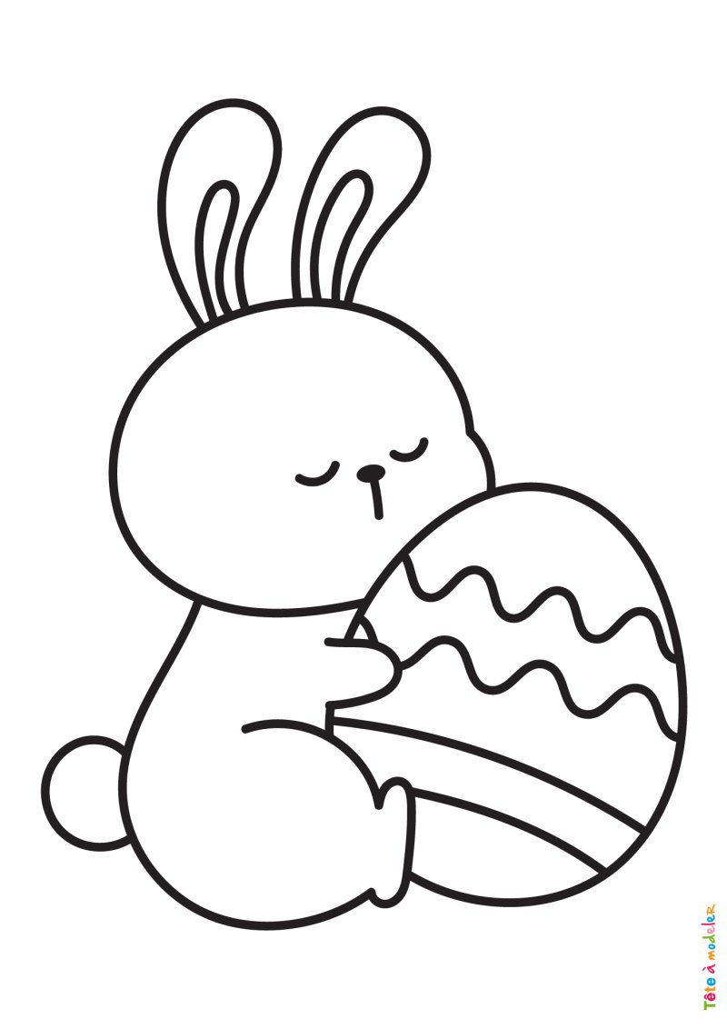 Coloriage d'un lapin mignon avec un oeuf de Pâques mignon