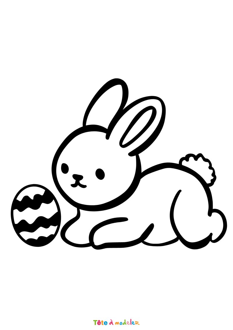 Coloriage d'un lapin de Pâques qui joue