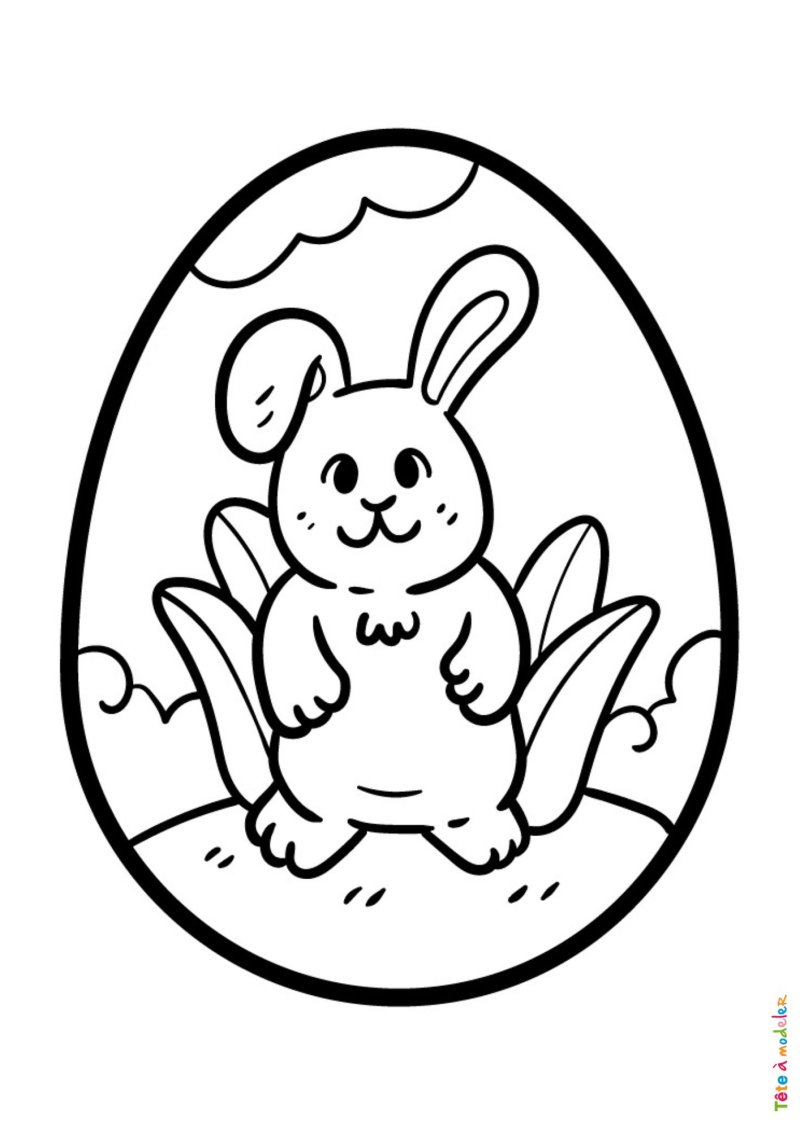 Coloriage d'un oeuf de Pâques décoré avec un lapin