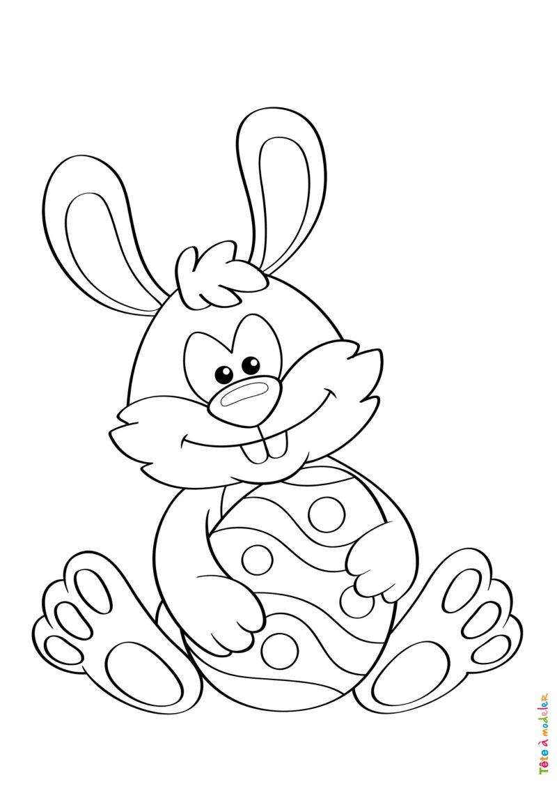 Coloriage d'un lapin avec son bel oeuf de Pâques