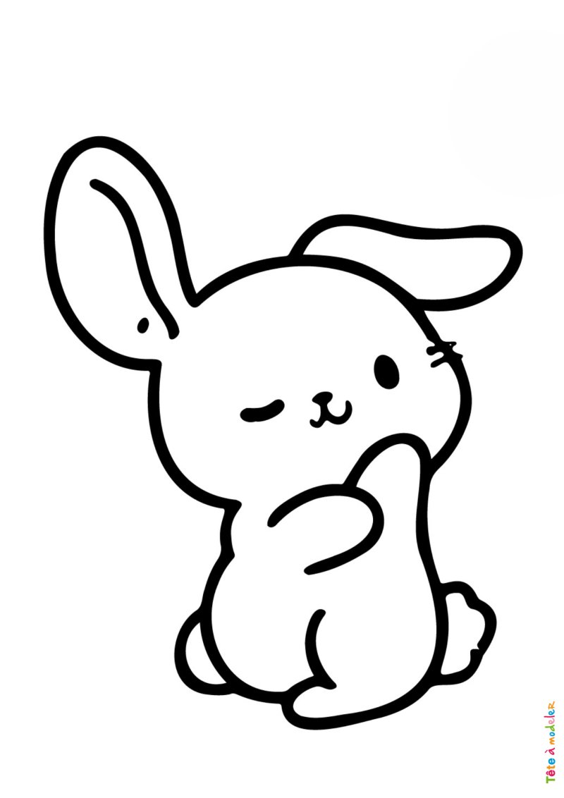 Coloriage d'un lapin de Pâques qui fait un clin d'oeil