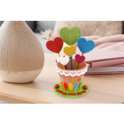 Coeurs dans un pot de fleurs