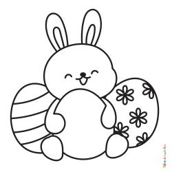 Retrouvez le coloriage d'un lapin et d'oeufs pour Pâques et imprimez aux enfants un joli dessin pour les fêtes