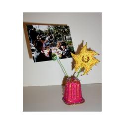 Porte photo réalisé avec un pot de yaourt et une étoile
