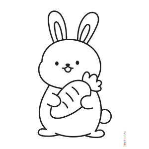 Coloriage de lapin qui tient une carotte