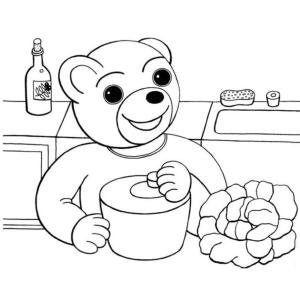 Un coloriage de Petit Ours Brun qui cuisine à imprimer