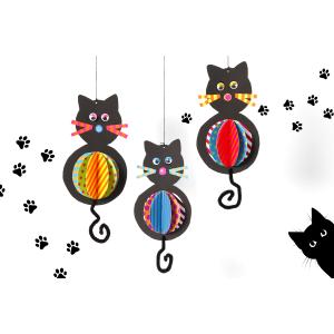 Fabriquez des chats rigolos à suspendre à la fenêtre ou dans la chambre . Il vous faudra :	1 silhouette chat en papier noir (18 x 10 cm)	3 disques en papier coloré Ø 8 cm	4 moustaches en papier coloré