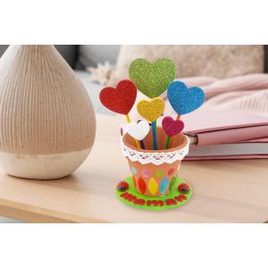 Coeurs dans un pot de fleurs