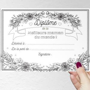 Un diplome de la meilleure maman du monde à imprimer, compléter et à offrir à la meilleure maman pour la fete des meres. Ce joli diplome avec ses fleurs sera très beau enroulé avec un morceau de ruban