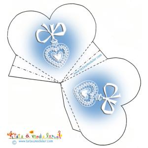 Pochette dragées bleue motif médaille