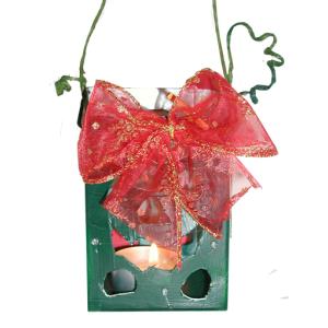 Fabriquer un photophore de Noël ciselé et décoré d'un noeud