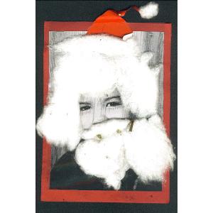 enfant transformé en Père Noël sur une carte de voeux