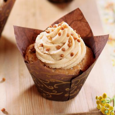 Il existe de nombreuses variétés de cupcakes américains, mais dans cette recette le cupcake est aromatisé avec l'un des ingrédients typiquement américain : les cacahuètes ! Ce cupcake est garnit d'un 