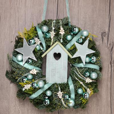 Quelle est l'origine de la couronne de Noël ? La réponse de Tête à modeler