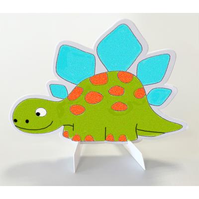 Dinosaures décorés avec du sable coloré