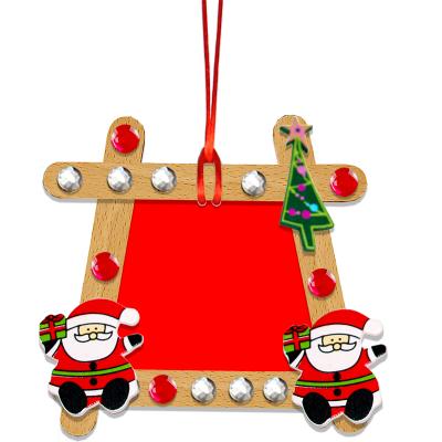 Tableau de Noël en bâtons de bois