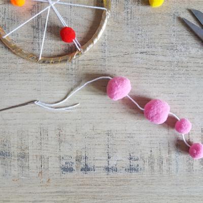 Enfiler les pompons