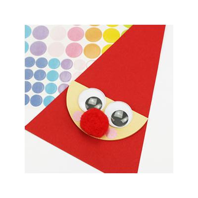 Coller des gommettes pour les joues :
