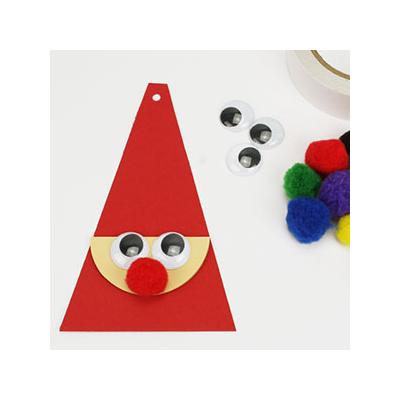Coller les yeux et le nez du Père Noël :