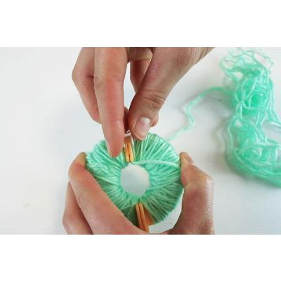 Faire un pompon :
