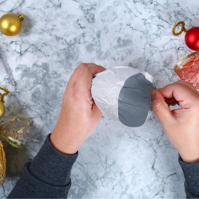 Enrouler la bouteille de papier