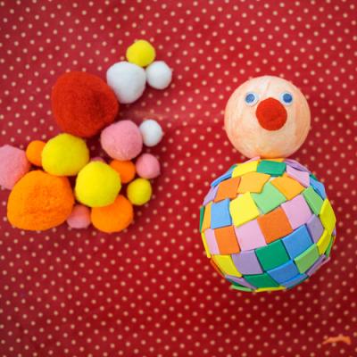 Coller le pompon :